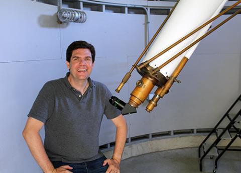 Michael Faison, a senior lecturer in the Department of Astronomy, photographed at the Leitner Family Observatory and Planetarium. Photograph by Christian Soler and Leah Salovey for the FAS Dean's Office. Michal Faison at Leitner Family Observatory and Planetarium